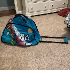 Victoria’s Secret Rolling Duffle Bag Luggage